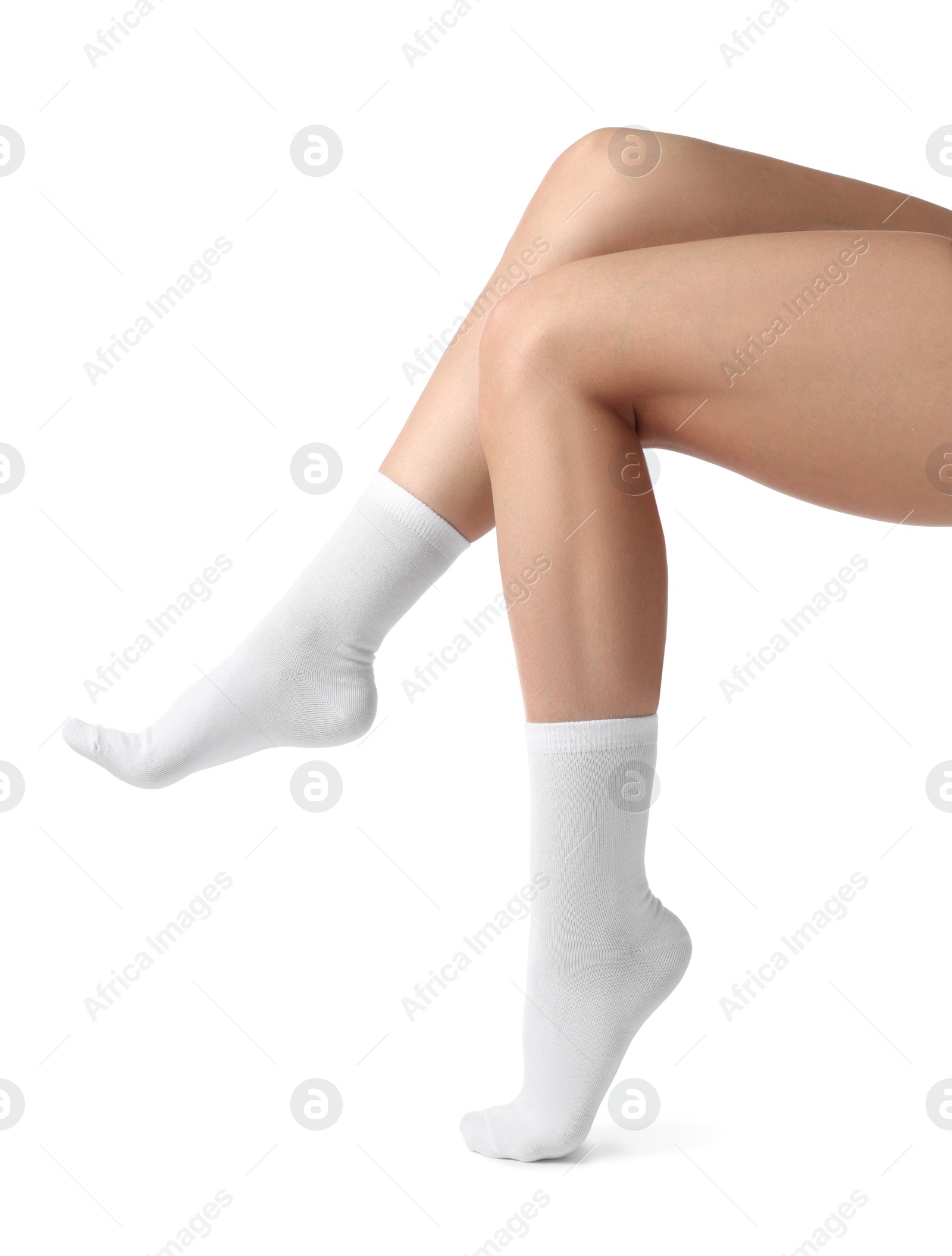 Photo of Woman in stylish socks on white background, closeup