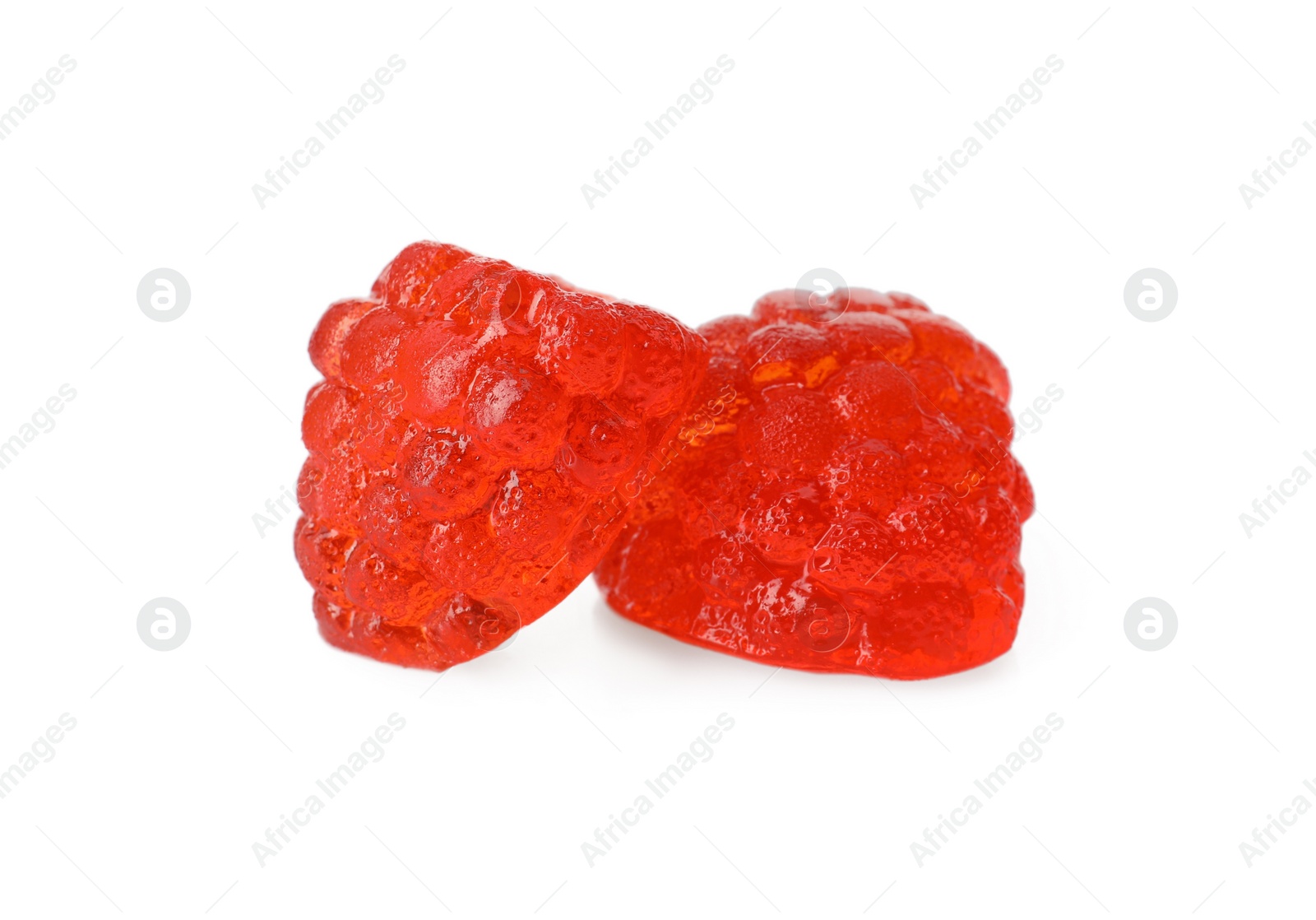 Photo of Delicious gummy raspberry candies on white background