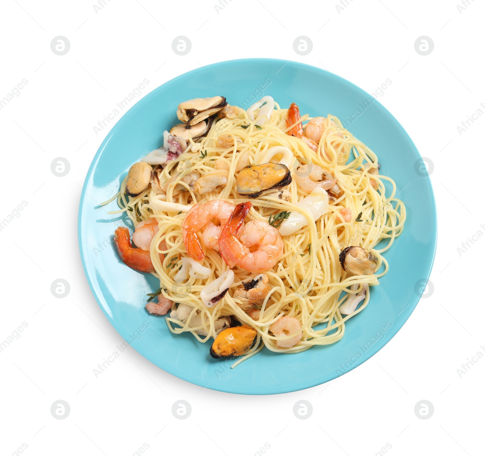 Photo of Delicious pasta with sea food in plate isolated on white, top view