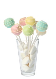 Glass with sweet colorful cake pops on white background