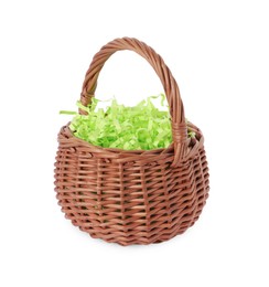 Easter wicker basket with decorated grass isolated on white