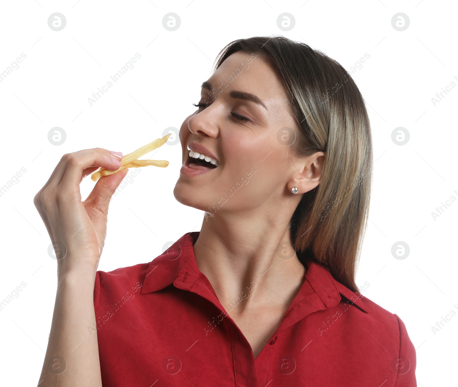 Photo of Young woman eating French fries on white background