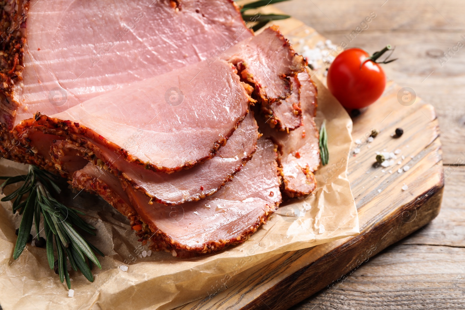 Photo of Delicious ham on wooden table, closeup. Christmas dinner