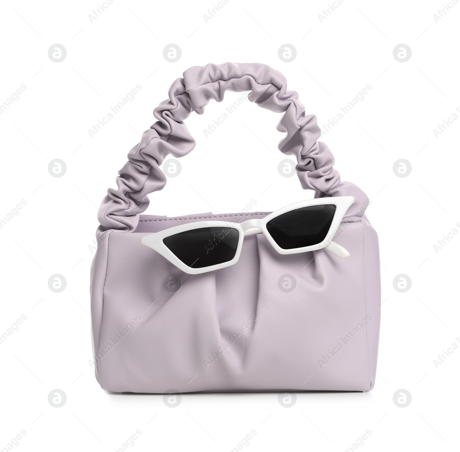 Photo of Stylish woman's bag and sunglasses isolated on white