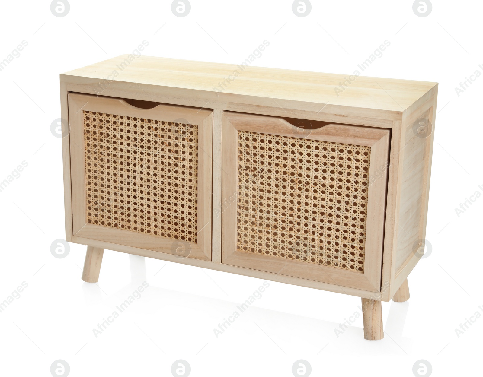 Photo of New wooden commode on white background. Interior element