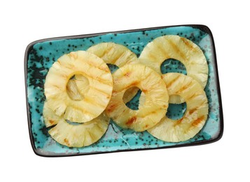 Tasty grilled pineapple slices isolated on white, top view