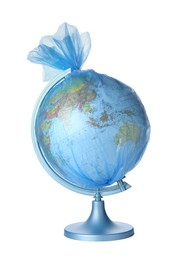 Photo of Globe in blue plastic bag isolated on white. Environmental protection concept