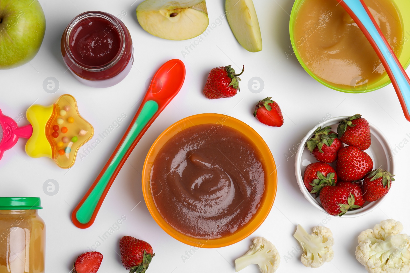 Photo of Flat lay composition with baby food and ingredients on white background