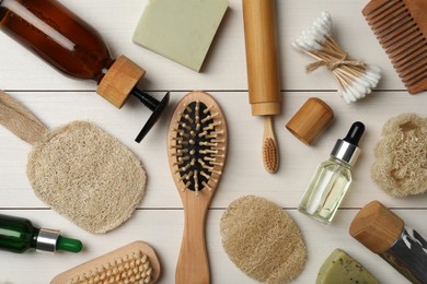 Photo of Flat lay composition with eco friendly products on white wooden background. Conscious consumption