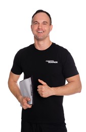 Photo of Personal trainer with clipboard showing thumb up on white background. Gym instructor