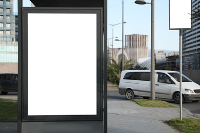 Image of Bus stop with empty signboard in city. Mock-up for design