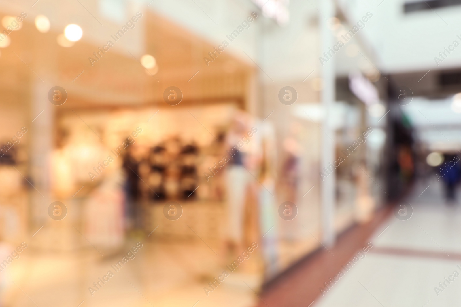 Photo of Blurred view of shopping mall interior. Bokeh effect