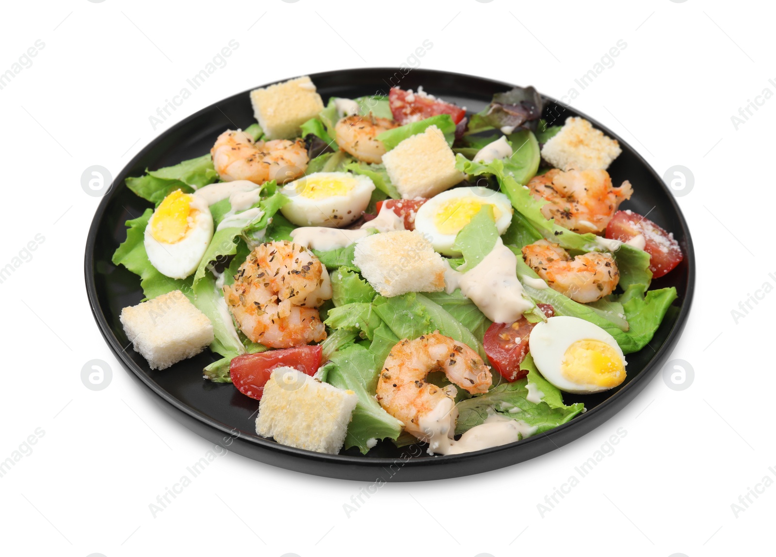 Photo of Delicious Caesar salad with shrimps isolated on white