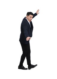 Photo of Businessman in suit posing on white background