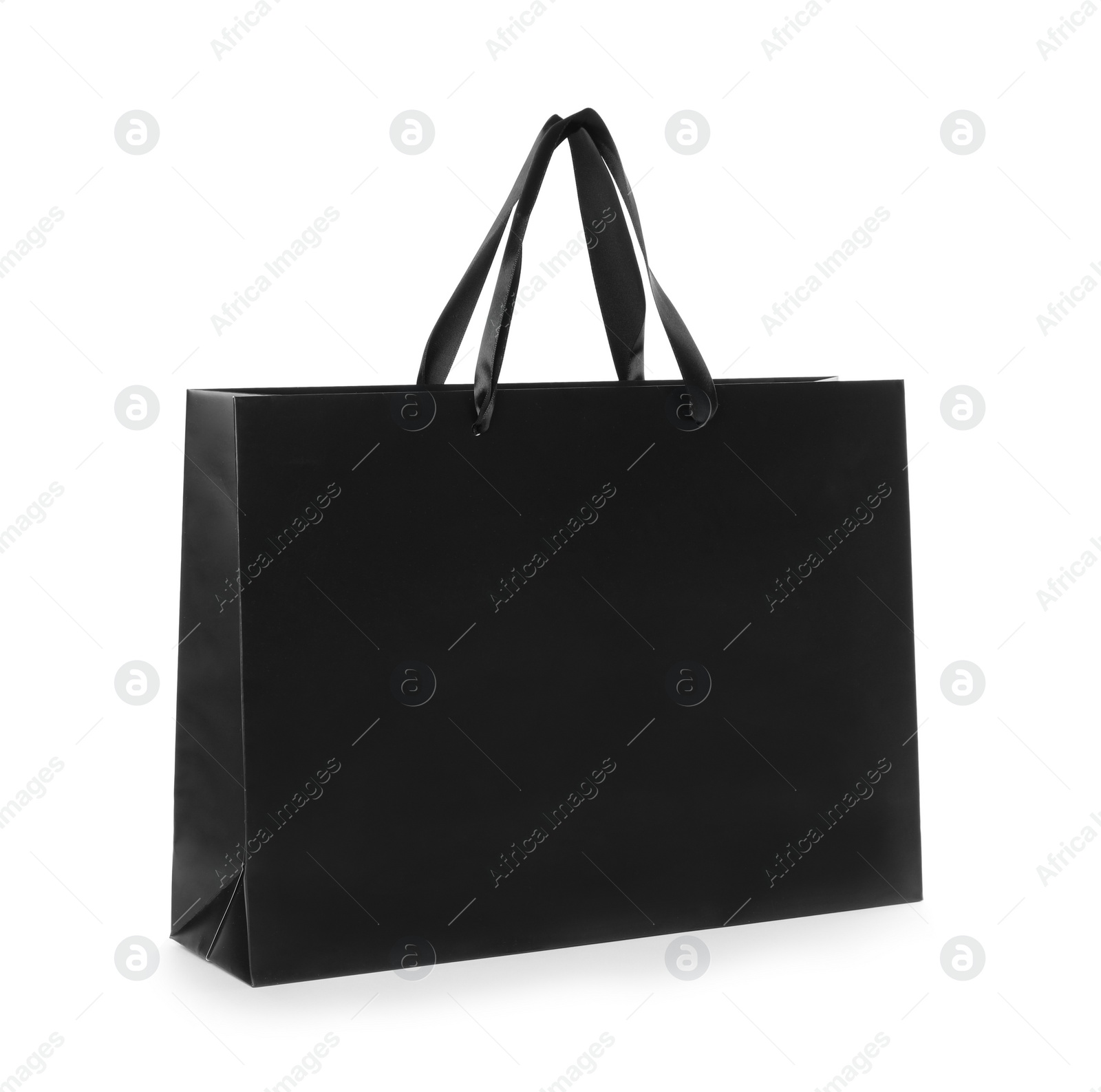 Photo of Paper shopping bag isolated on white. Mock up for design