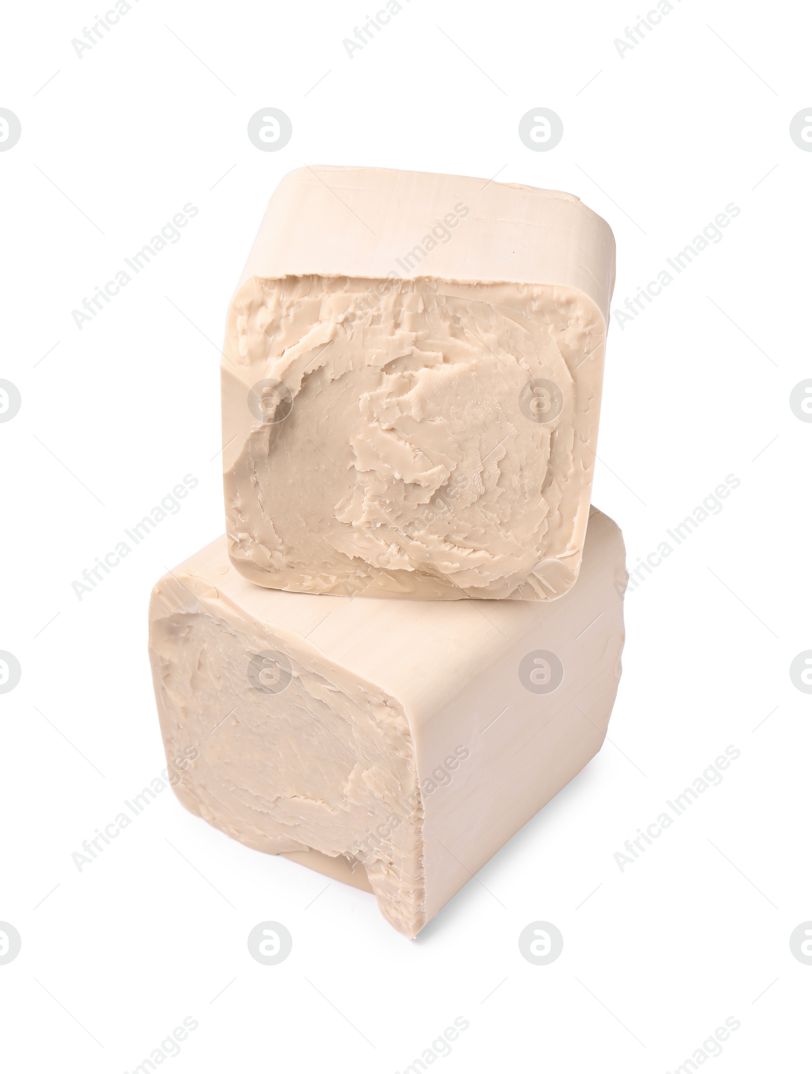 Photo of Blocks of compressed yeast isolated on white