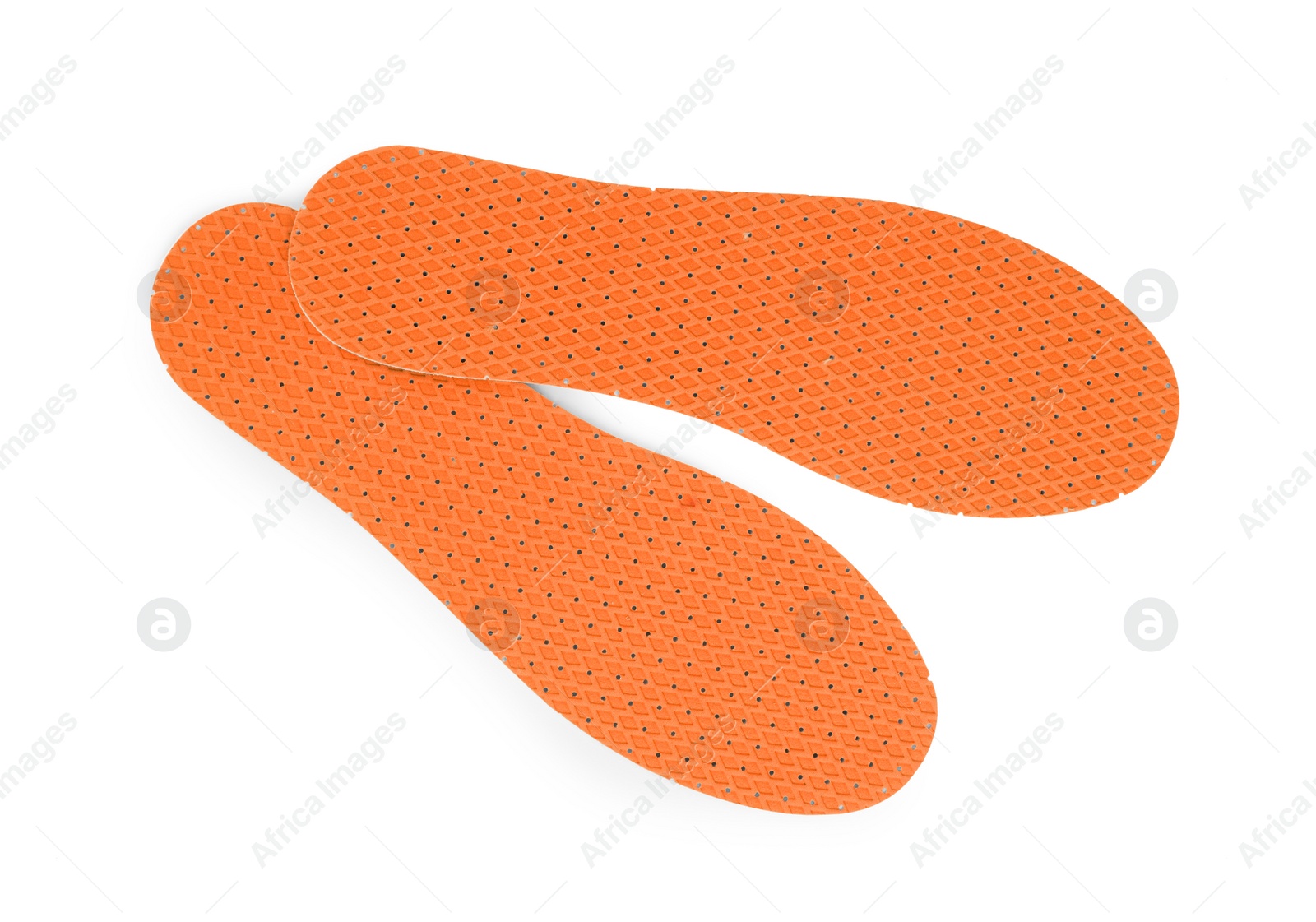 Image of Pair of orange orthopedic insoles on white background, top view