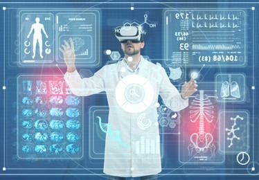 Image of Medical technology concept. Doctor using virtual reality headset to study health data of patient