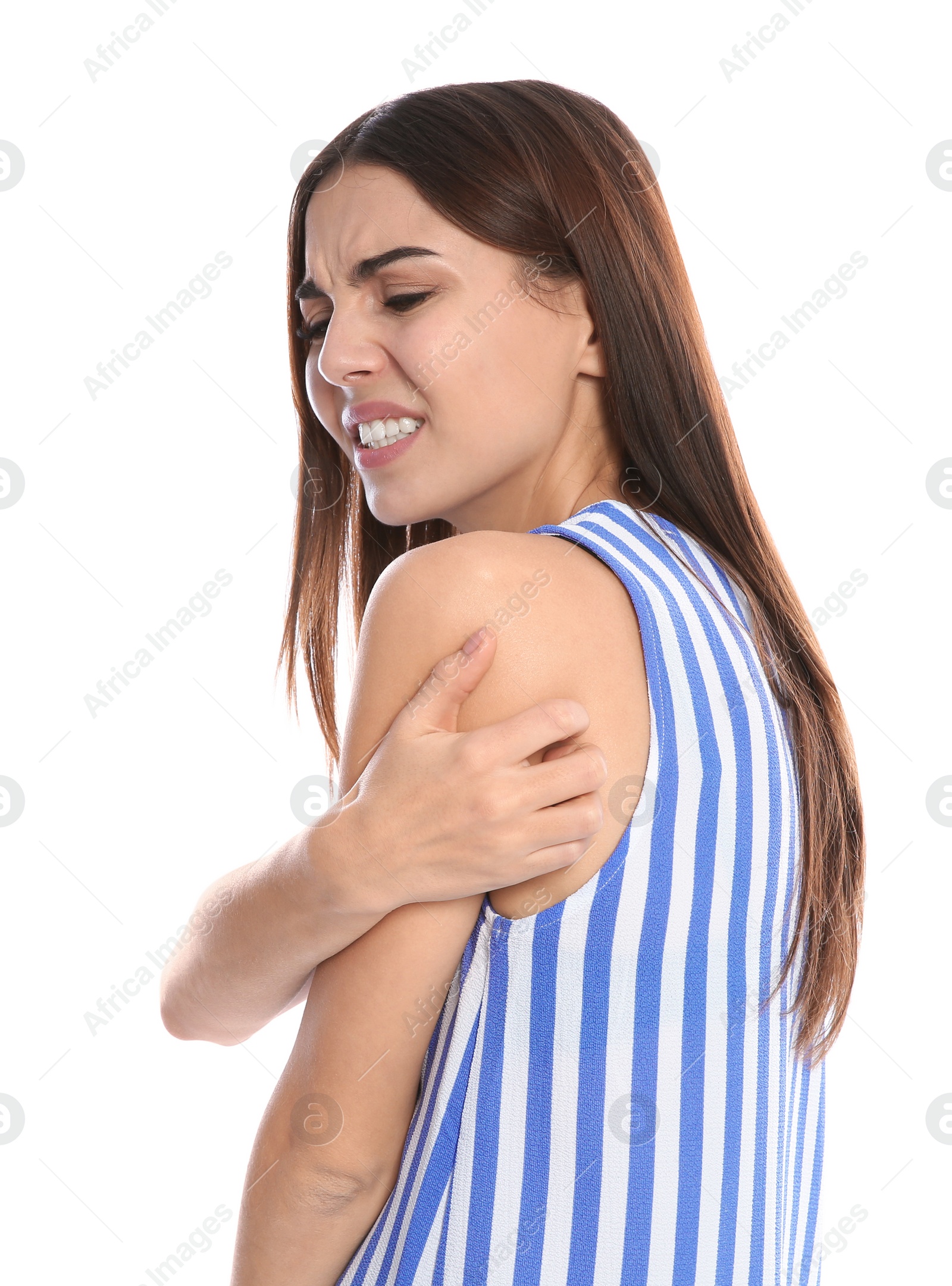 Photo of Young woman scratching shoulder on white background. Annoying itch