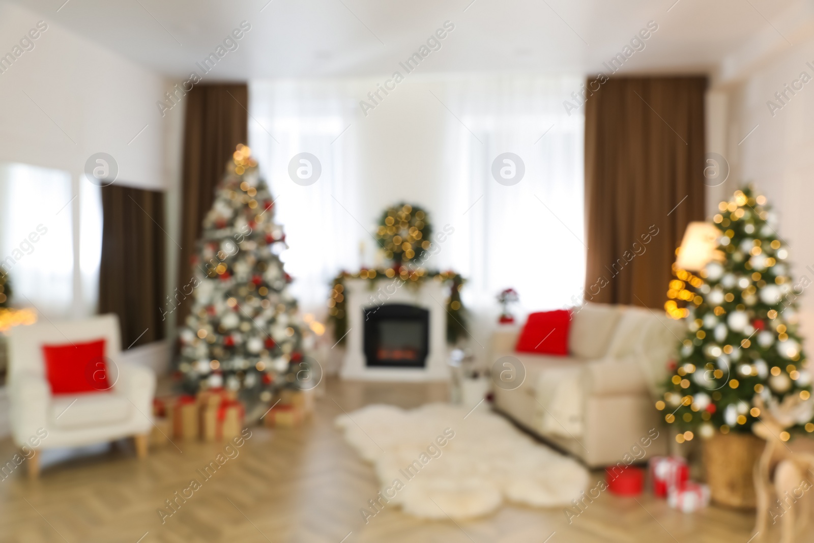 Photo of Blurred view of living room with Christmas decorations. Interior design