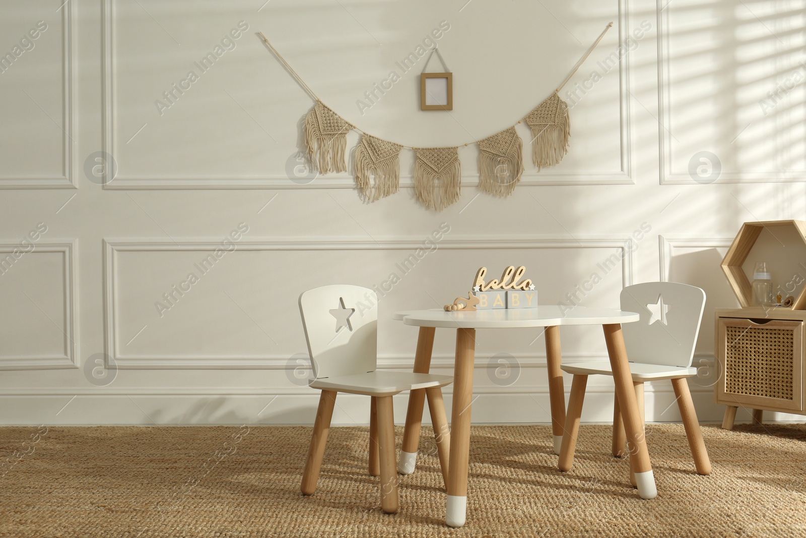 Photo of Modern child room interior with stylish furniture and accessories