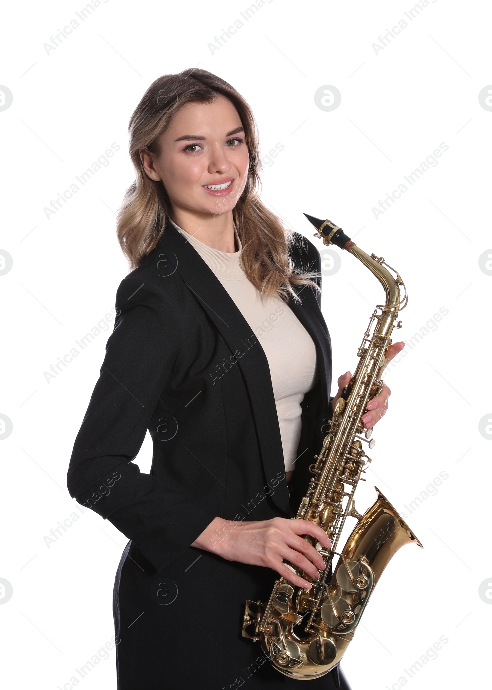 Photo of Beautiful young woman in elegant suit with saxophone on white background