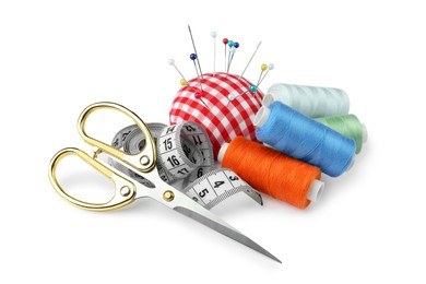 Set of different sewing accessories on white background
