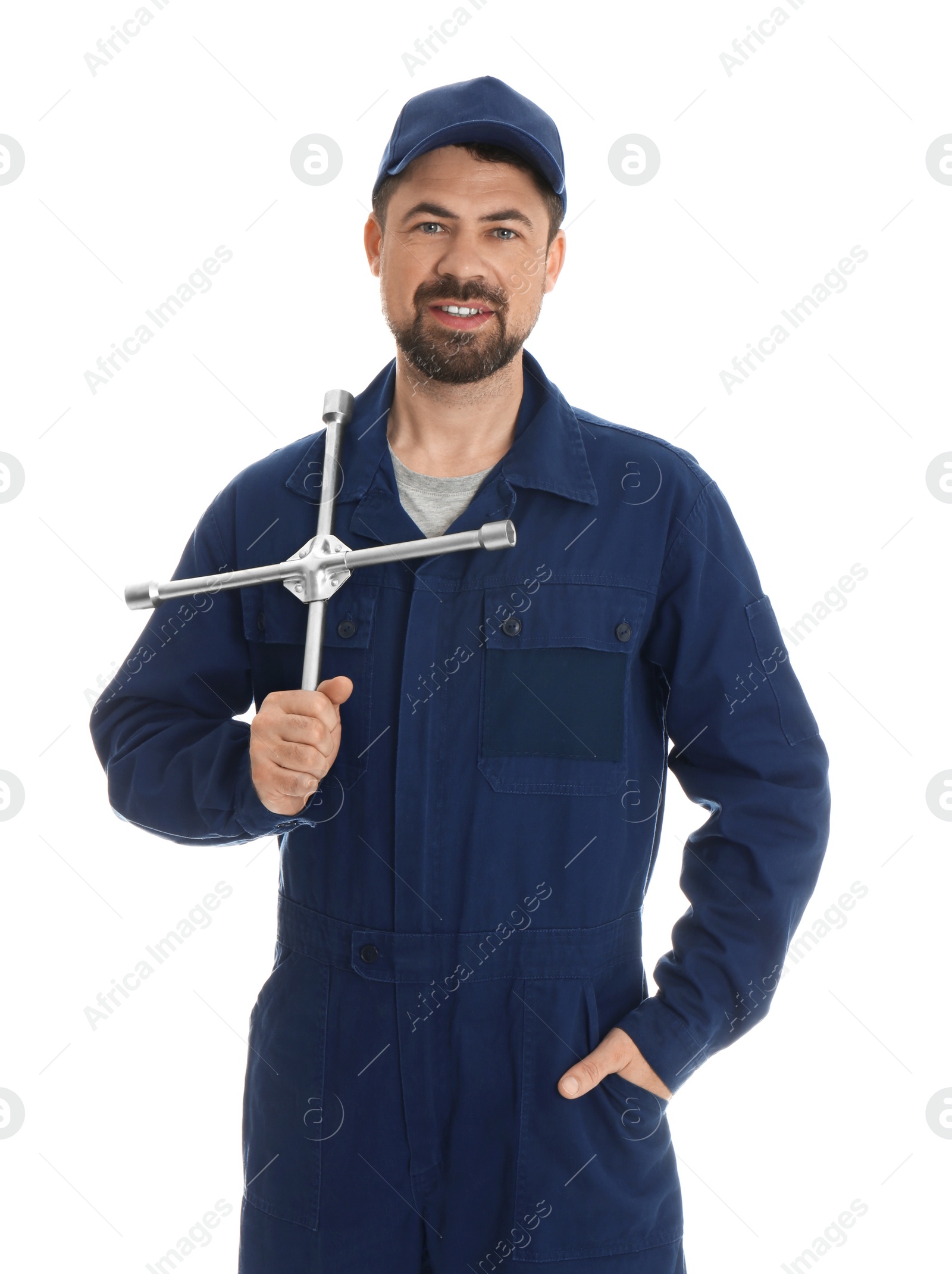 Photo of Portrait of professional auto mechanic with lug wrench on white background