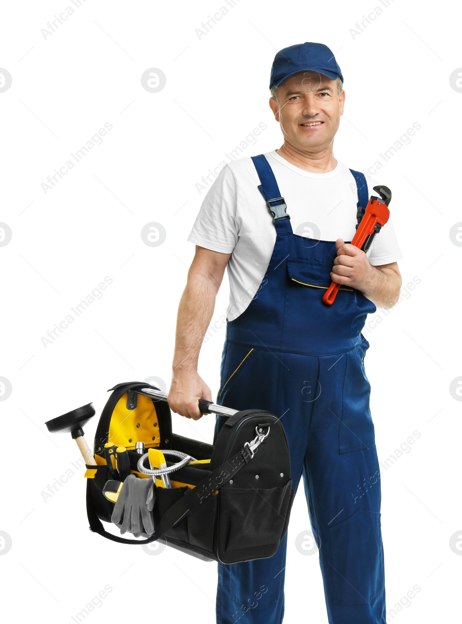 Photo of Mature plumber with pipe wrench and tool bag on white background