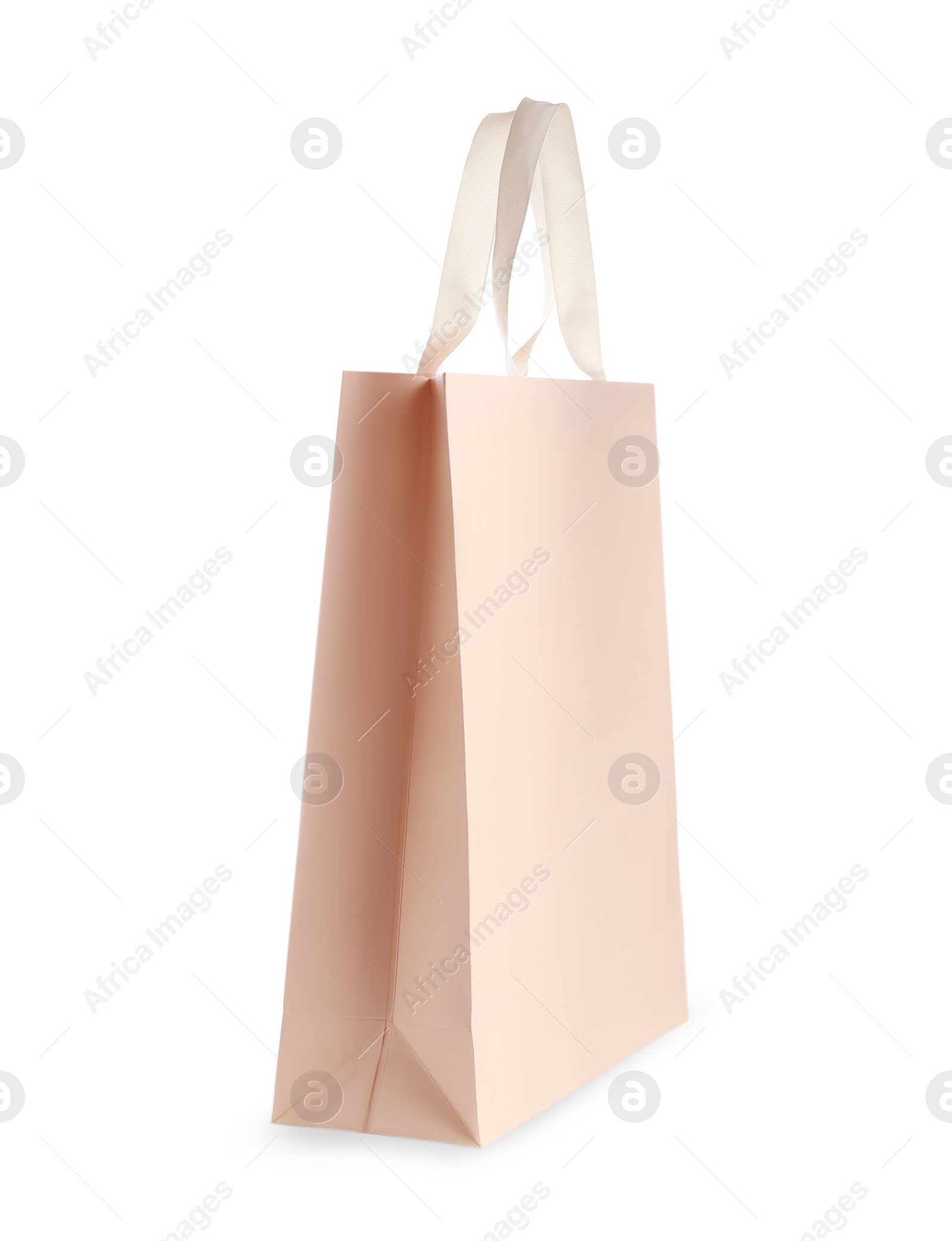 Photo of One paper bag isolated on white. Mockup for design