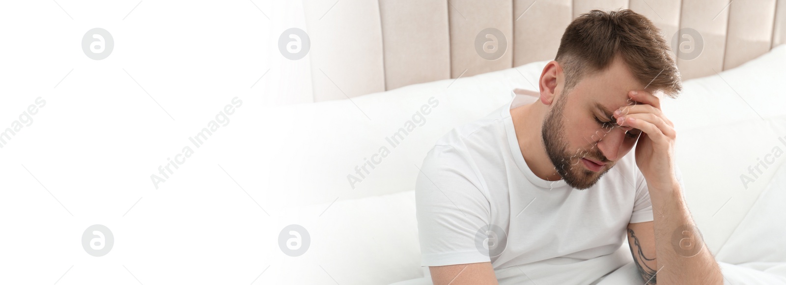 Image of Tired man in bed, space for text. Banner design