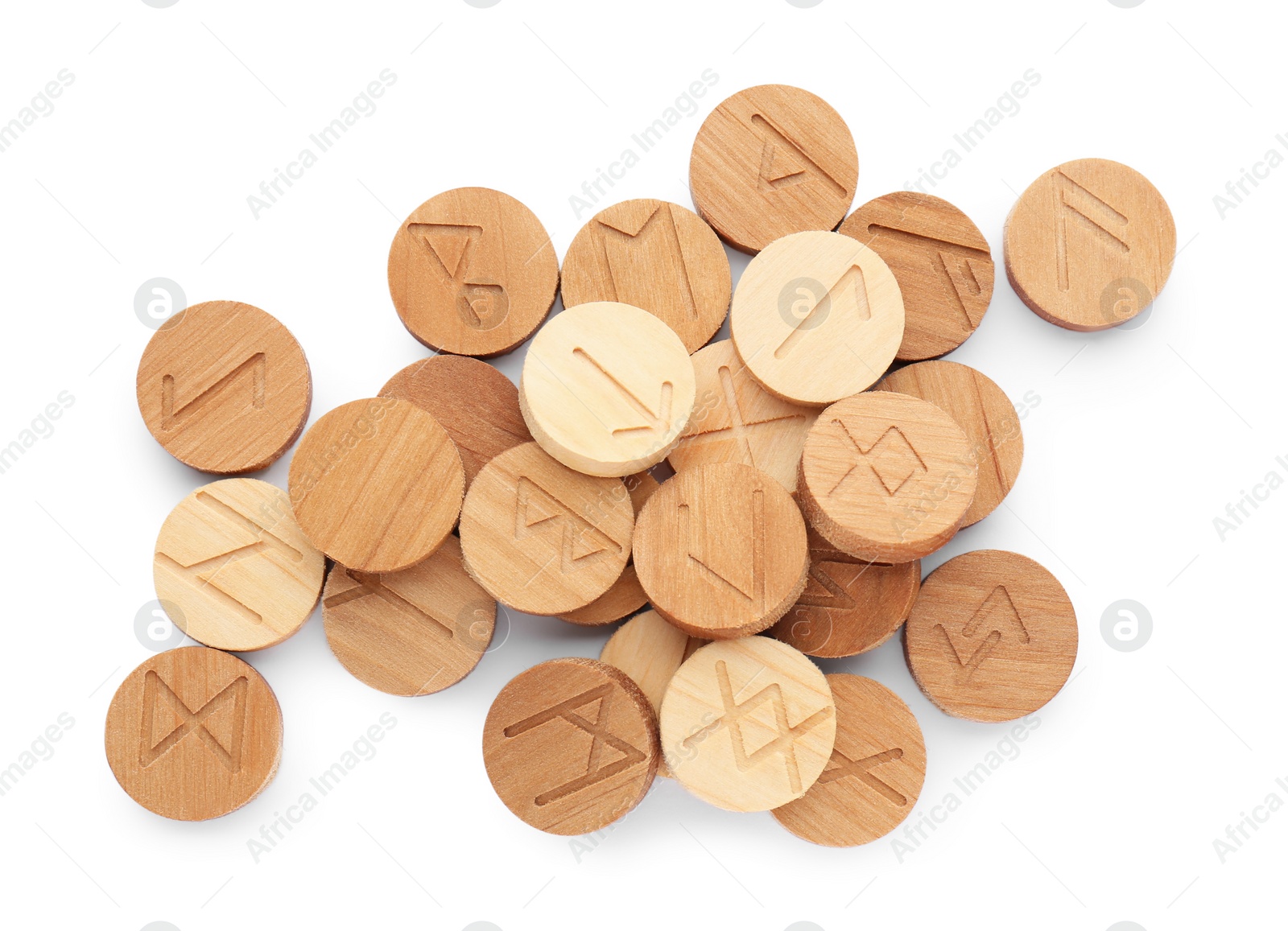 Photo of Pile of wooden runes isolated on white, top view