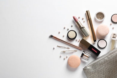 Photo of Set of luxury makeup products on white background, flat lay