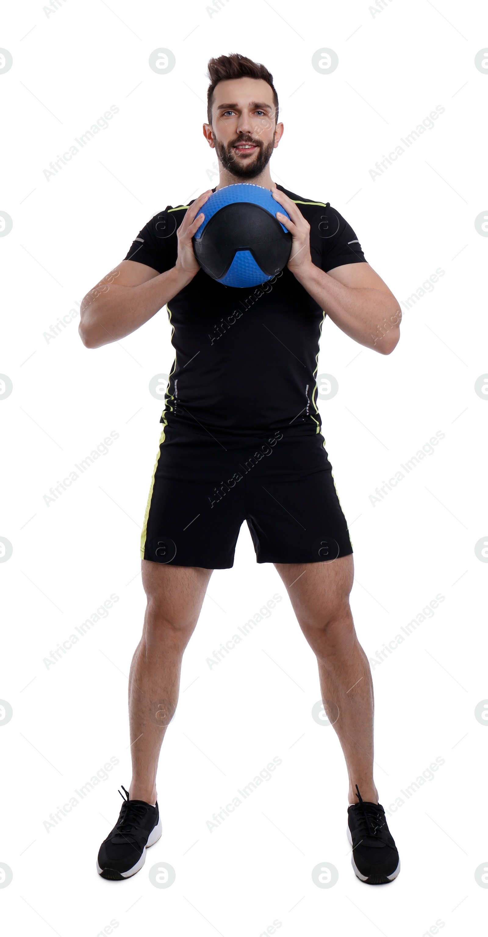 Photo of Athletic man doing exercise with medicine ball isolated on white