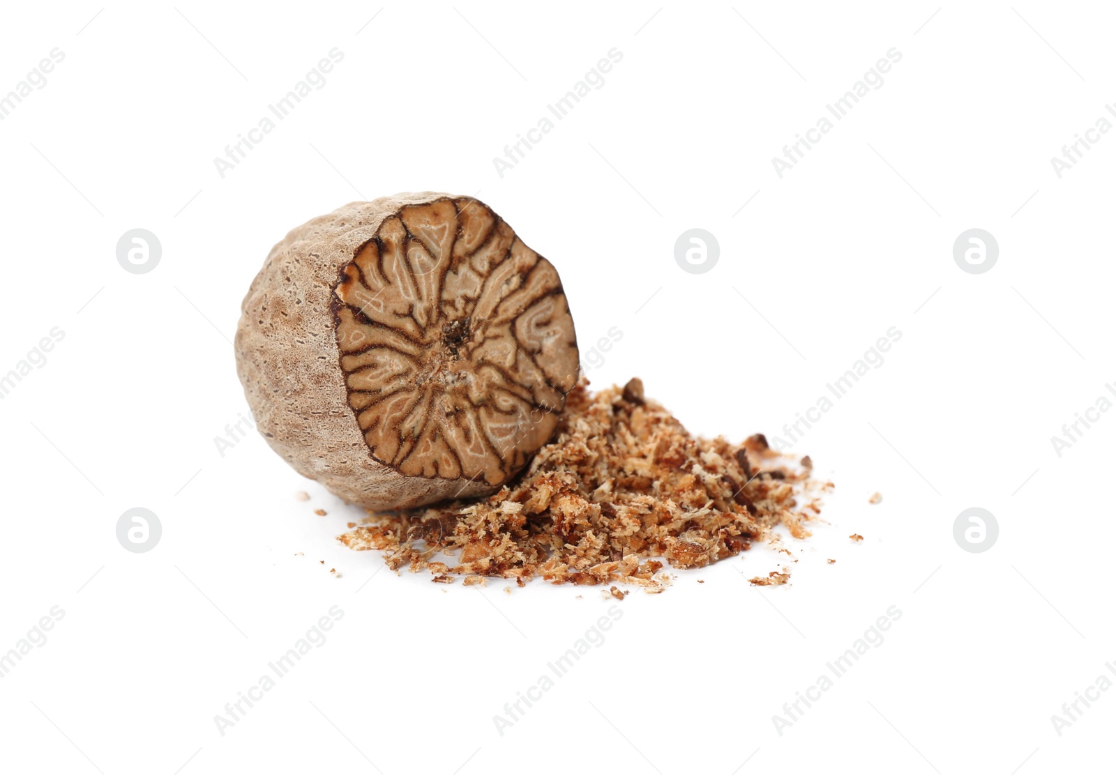 Photo of Grated nutmeg and seed isolated on white