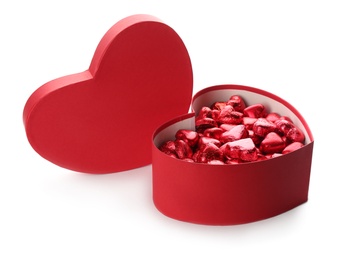 Heart shaped chocolate candies in box on white background