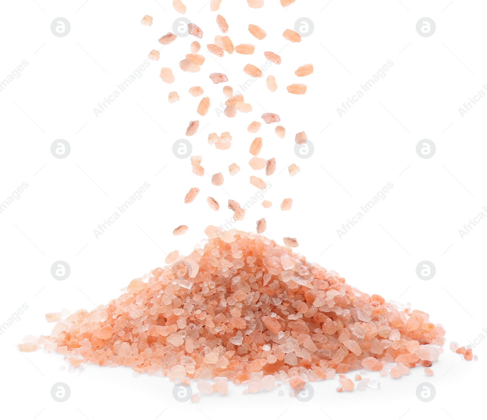 Image of Pink himalayan salt falling on white background