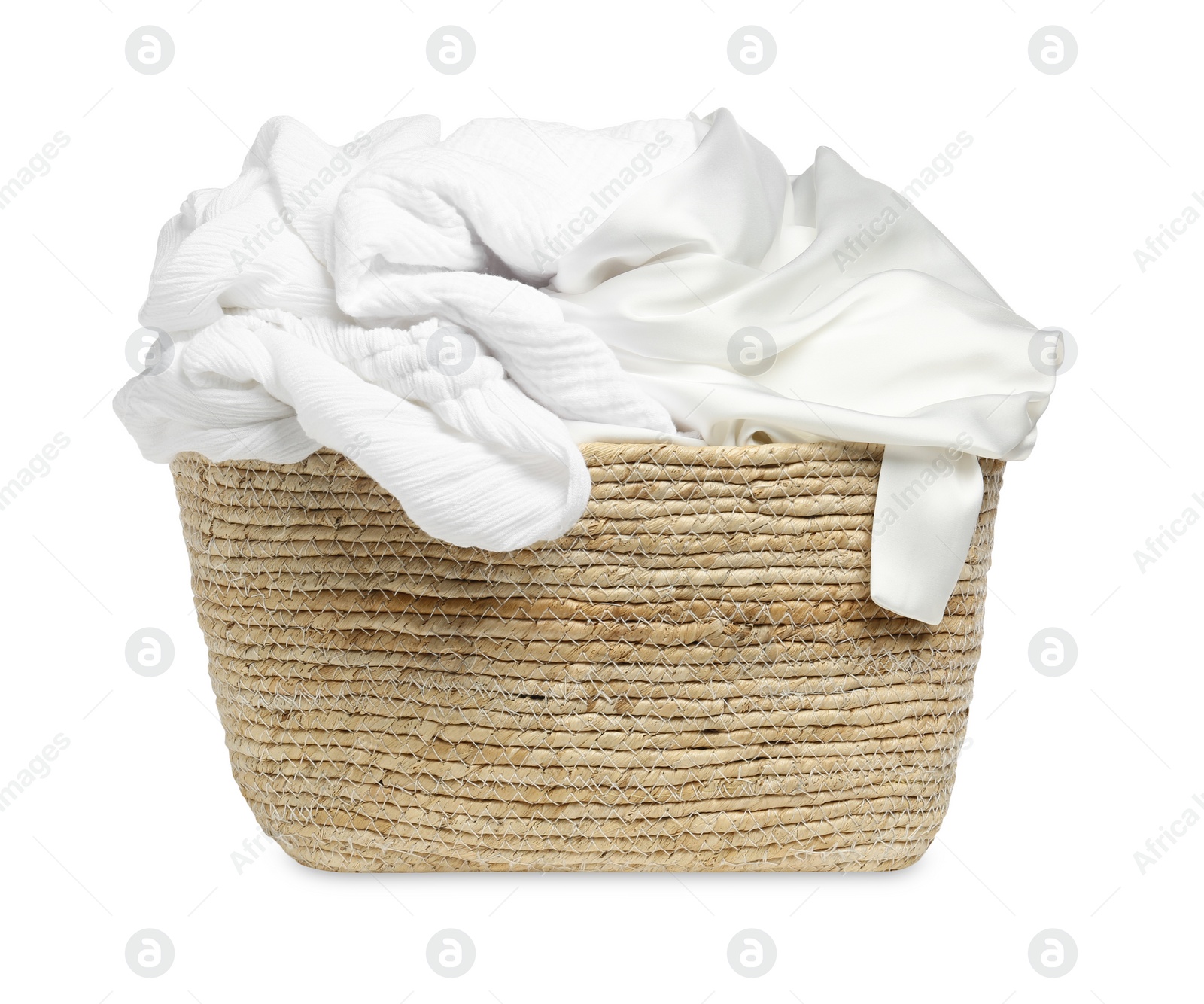 Photo of Wicker laundry basket with clean clothes isolated on white