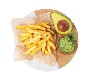 Photo of Tray with delicious french fries and avocado dip isolated on white, top view