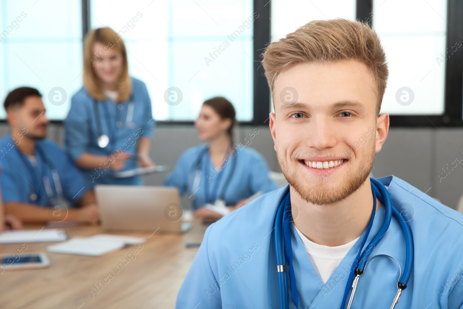 Photo of Medical student with groupmates in university library