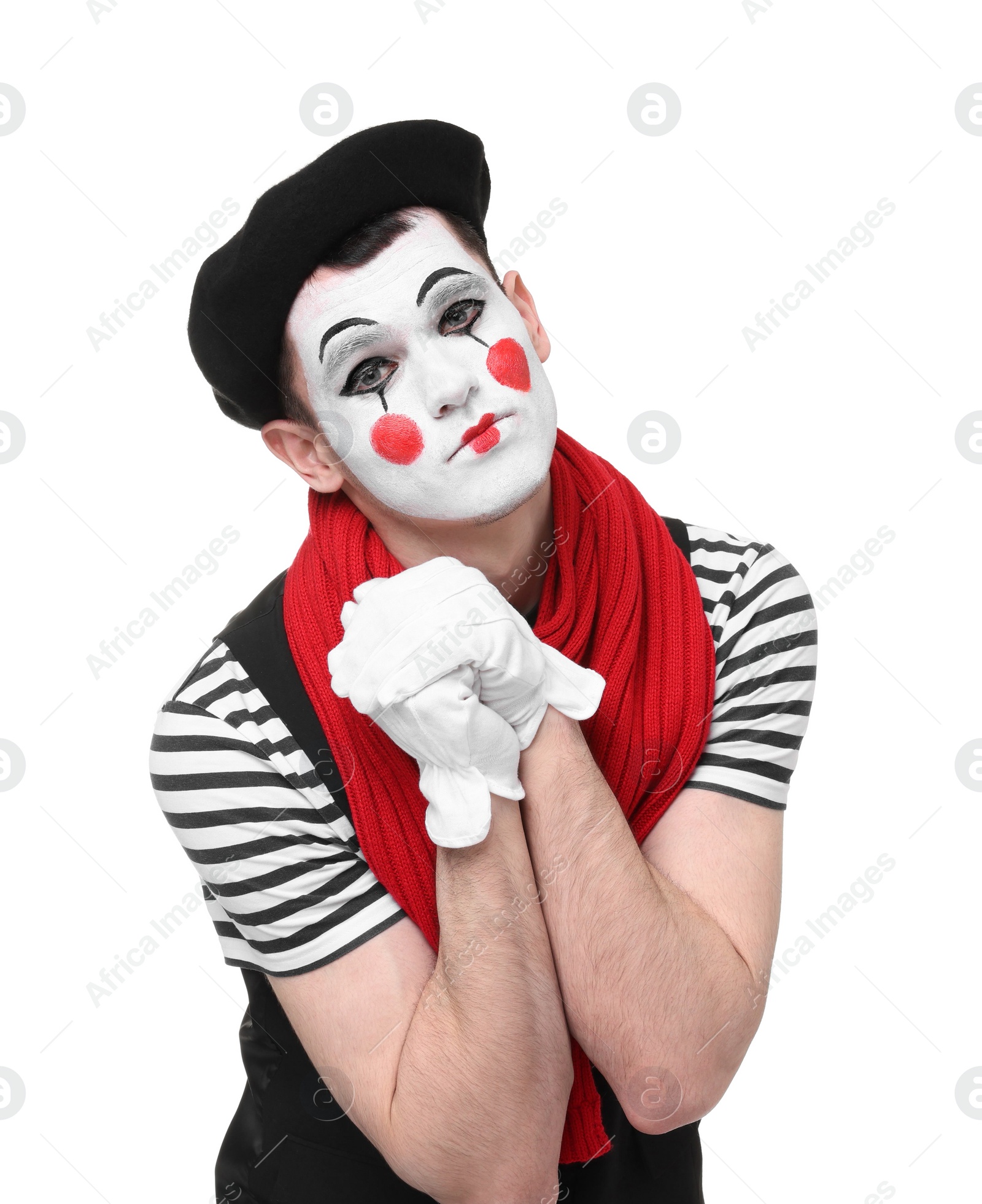 Photo of Funny mime artist in beret posing on white background