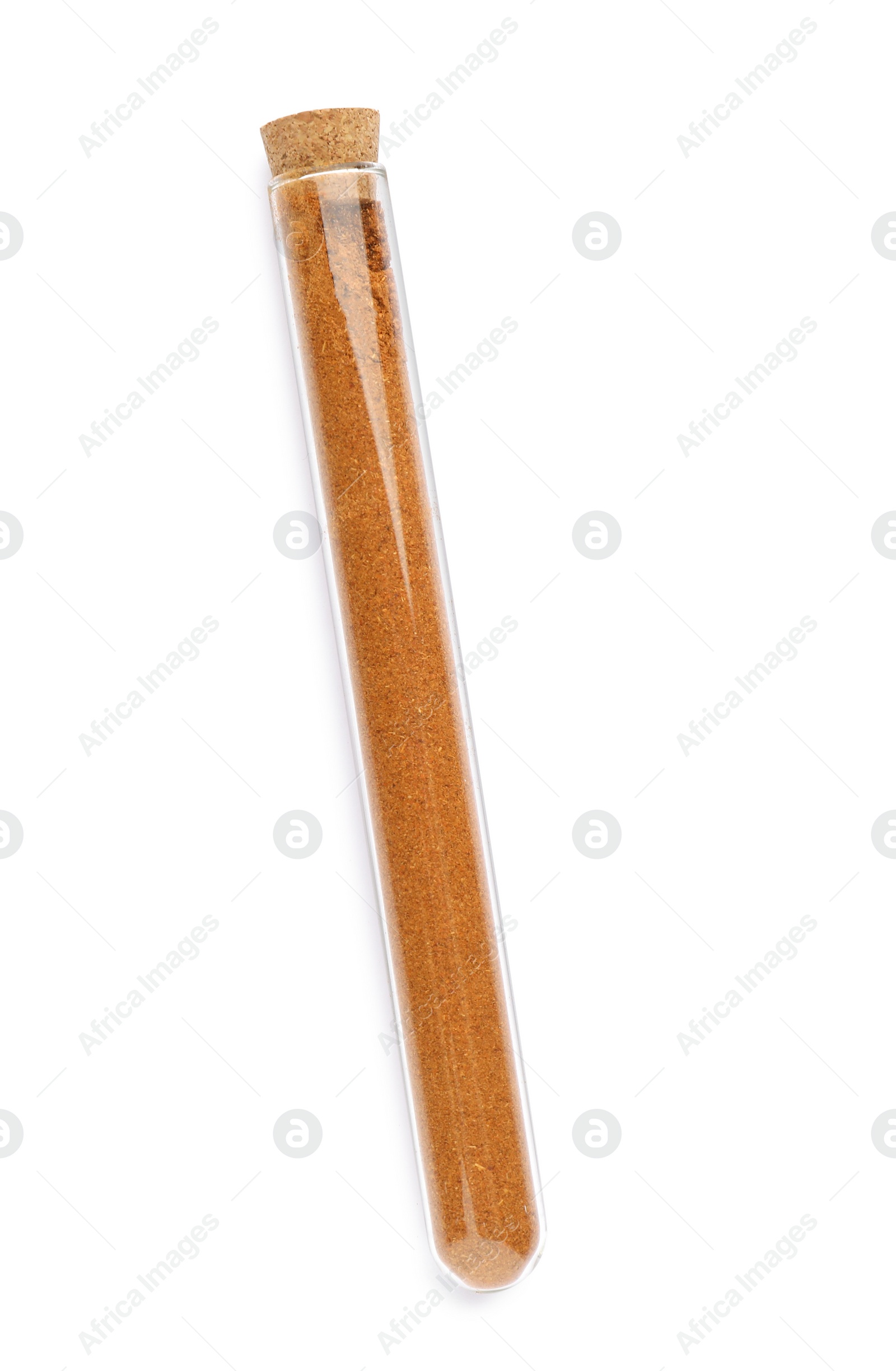 Photo of Glass tube with ground red pepper on white background, top view