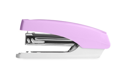 Photo of Pink stapler isolated on white. Stationery for school