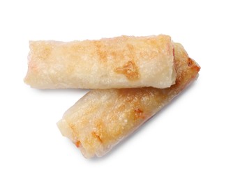 Delicious fried spring rolls isolated on white, top view