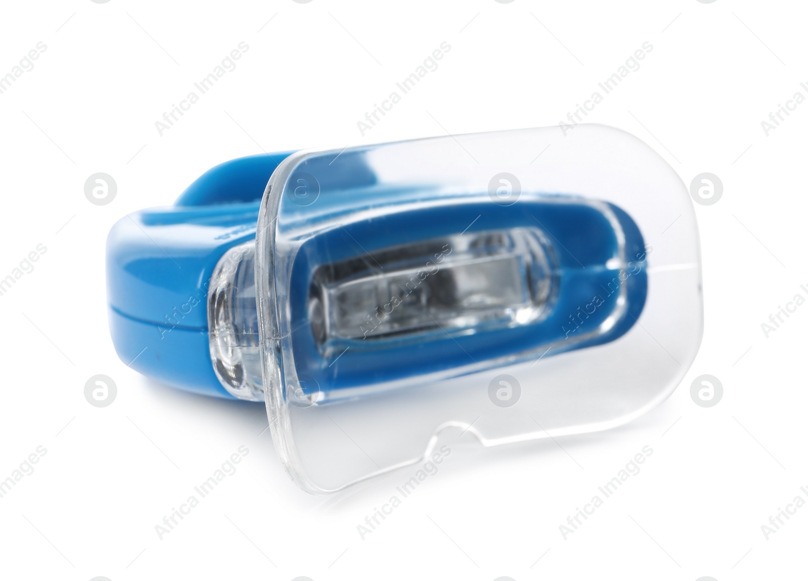 Photo of Tooth whitening device on white background. Dental care