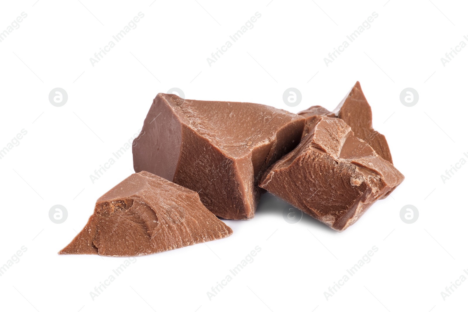 Photo of Pieces of tasty milk chocolate isolated on white