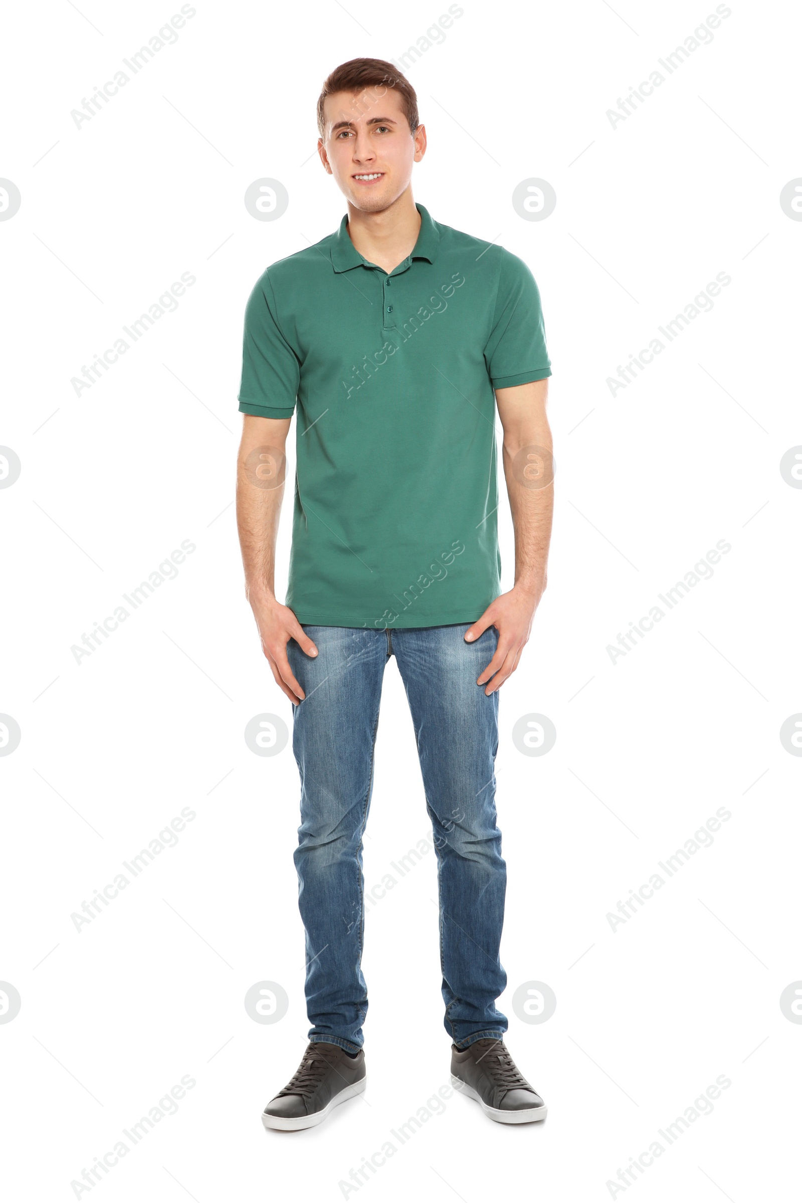 Photo of Full length portrait of young man in stylish clothes on white background