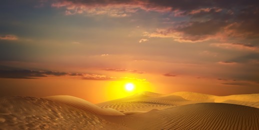 Image of Beautiful view of sandy desert at sunset. Banner design