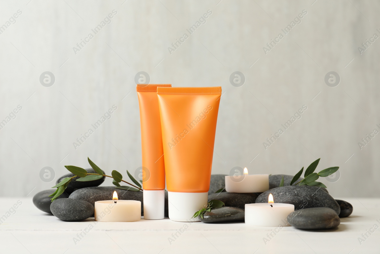 Photo of Composition with cosmetic products on white table