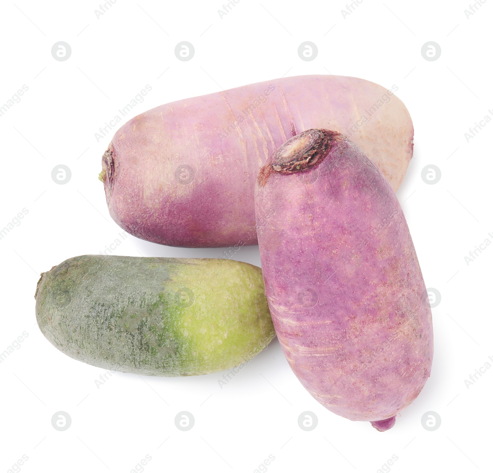 Photo of Purple and green daikon radishes isolated on white, top view